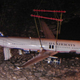 The Airbus A320 of Flight 1549 is hoisted from the frozen waters of the Hudson River two days after the accident (Spyropk)